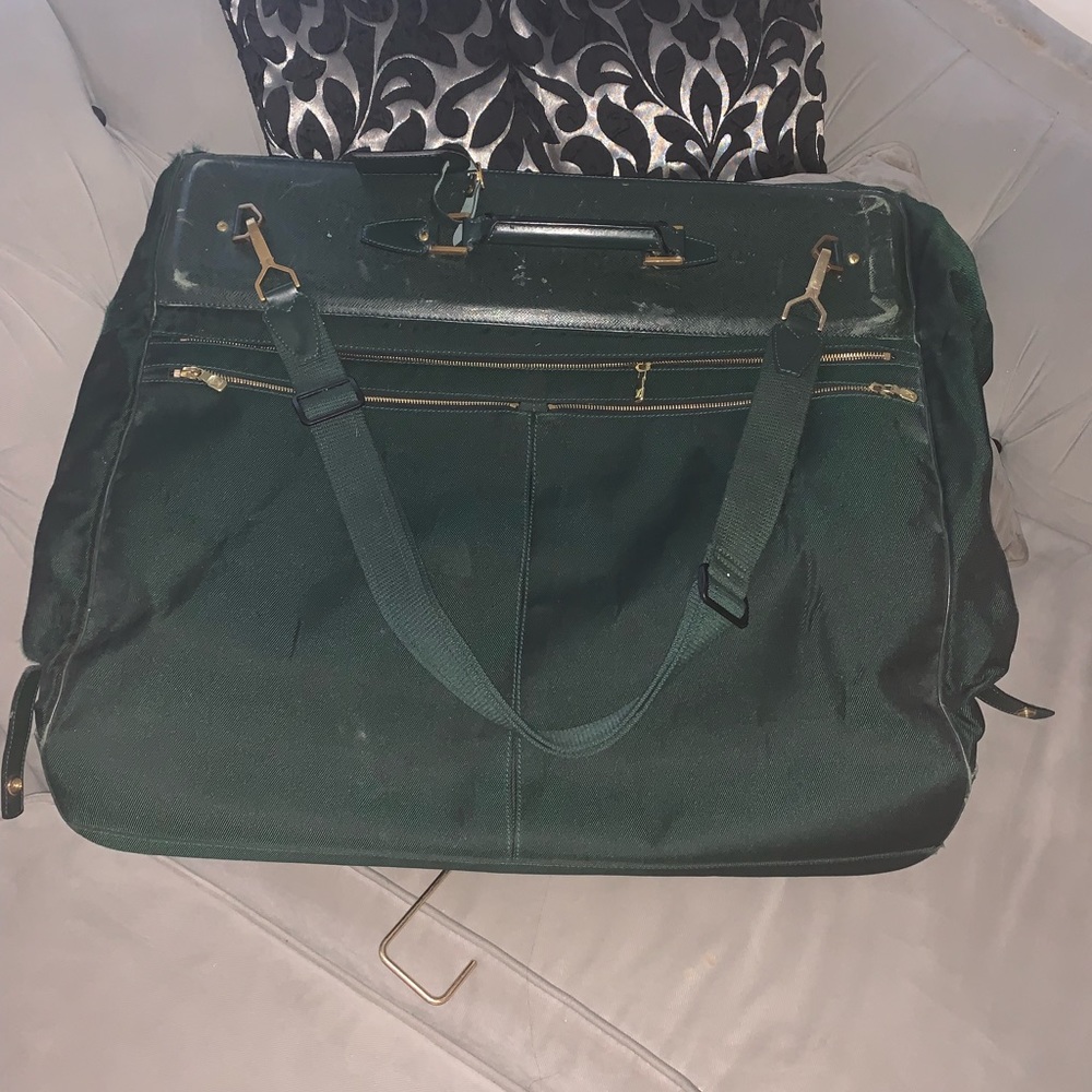 LOUIS VUITTON
EPICEA TAIGA & CANVAS GARMENT BAG
